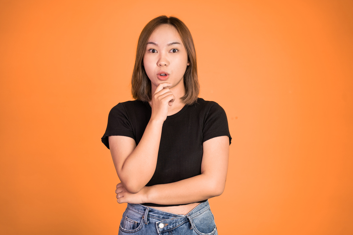 Curious Expression of Young Asian Woman Portrait